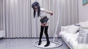 ADM105-The girl, bound to extreme conditions, is whipped. She tries to dodge, but the restraints and vibration devices prevent her from doing so.