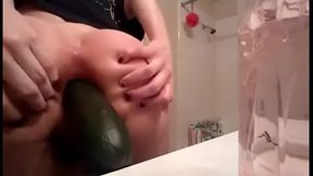Young blonde gf fists herself and puts a cucumber in ass