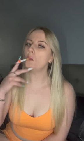 smoking in Orange dress