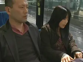 Luscious Japanese milf gives hand work and gets her pussy rubbed