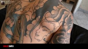 Tattooed Man with a Hot Brunette Girl Making Out