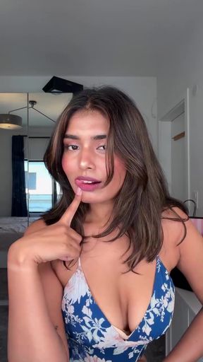 Sexy Indian woman shows off her curvy boobs in a solo scene