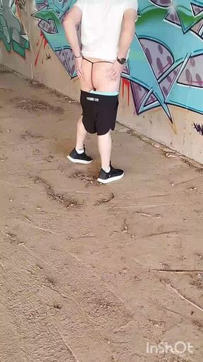 In Showing Her Ass in a Thong