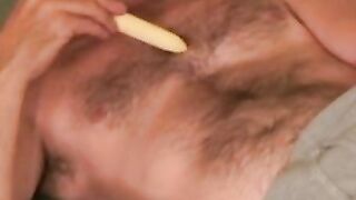 Handsome hairy dude plays with his dick and splooges solo