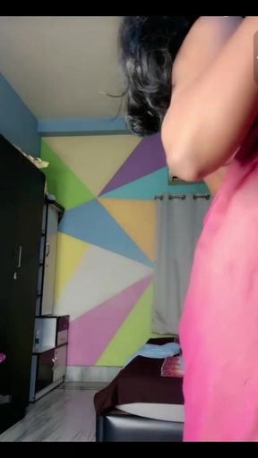 Indian housewife shows off her clothed body
