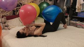Playing with balloons on my bed - Mishel Looner balloons