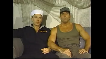 US service member Nick Romano and bluejacket Kip Hardin want to serve their country_ they willingly agreed to have a bit of Navy cake for equality of humans both staight and gays in the Army