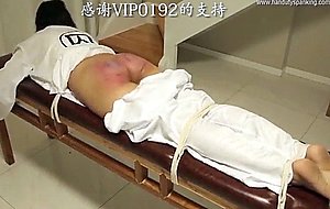 Asian girl takes 100 paddling swats
