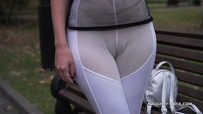 Milf flaunts sheer outfit in public park