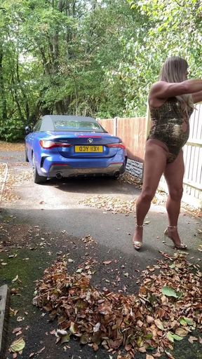 Sexy Crossdresser Kellycd2022 in Gold Swimsuit and Heels Clearing Leafs
