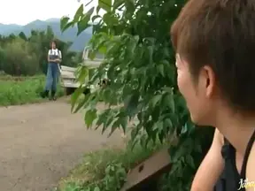 Japanese MILF Fucks Two Lewd Guys Outdoors and Gets Drenched in Facial Cum