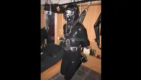 Master Ties Up Rubber Slave for Sensory Deprivation BDSM Fun