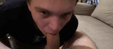 Clothed boy keeps sucking the cock until sperm begins to drop on his lips