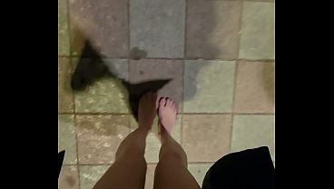 Barefoot and exposing my sexual organs.