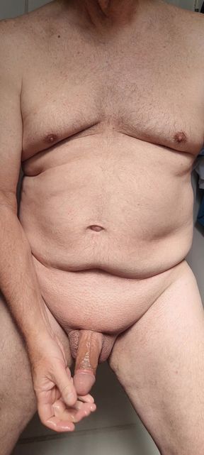 Morning masturbation - shaved, oiled, and ready to start my day with a slow stroke of my cock