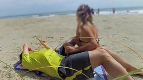 Dangerous and sensual blowjob on a public beach from a naughty MILF.