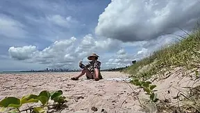 Milf flashing hairy pussy on public beach