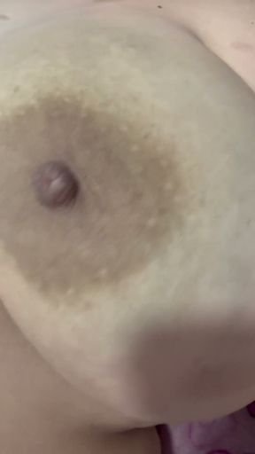 Mom plays with her big and delicious nipples   Clip 1