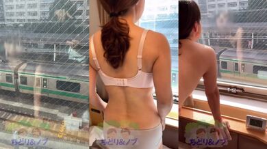 A petite Japanese beauty flashing naked outside hotel window to public train platform