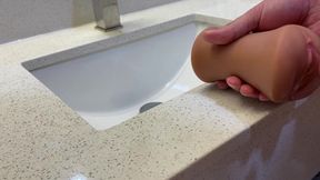 Hot wife pees on her hubby's thick cock in a hotel bathroom