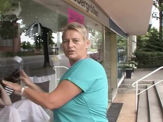 Blond German cougar rides large schlong in rented room