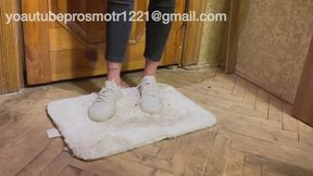 Nastya came in from the street in dirty sneakers, stepped on a snow-white, new, clean bath mat, and decided to wipe her dirty shoes on it. very dirty