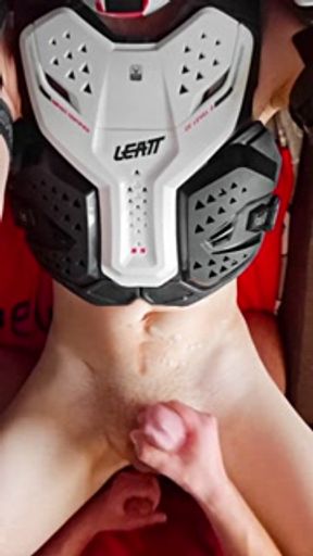 Guy in motocross gear and mxhelmet jerks off and cums