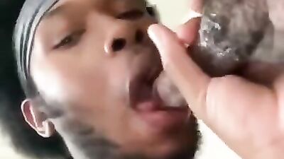 Black guy swallows a big black cock and gets a messy facial