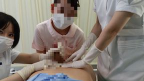 The Asian nurse and doctor examined the patient's buttocks and penis