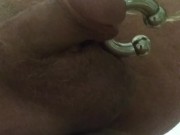 male pissing with large cockring