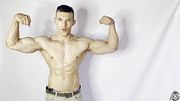Businessman unleashes his greatest instinct: flexing hot muscles