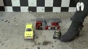 Toy cars under heeled Boots