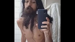 long bearded crossdresser masturbating while watching the sex goddess anna de ville
