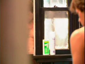 Brunette gives blowjob and has sex in the bathroom