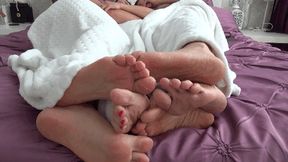 FOOT PLAY UNDER THE BLANKET (sp)