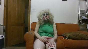 Trashed tranny slut Sarah Millward, fake tits flattened after night as a steetcorner whore, degrades heself further, drinking own piss and wanking