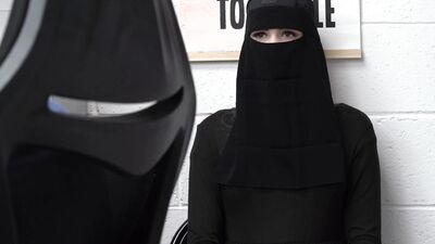 Blonde lady is wearing a burqa when stealing, and now she's caught