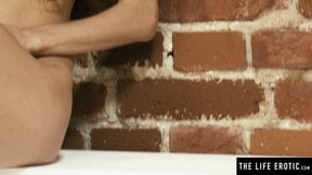Curly-haired Rebel Lynn rubs her soaking wet cherry