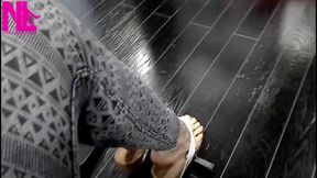 Shoeplay and Dangling in Cute White Flip Flops in a Store