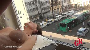 Sexy babe fucked on the window