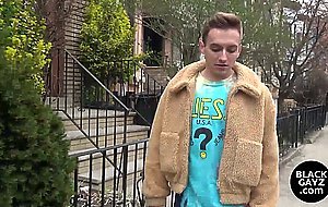 Young twink takes black hunks cock inside his asshole