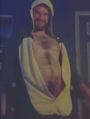 Hairy gay showering his cock in costume.