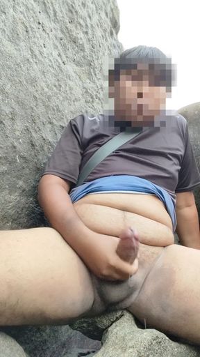 on the rocks by the sea