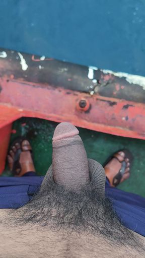 Peeing in the sea.