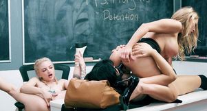 Big Tits teacher strapon screws her students and drills facedildo