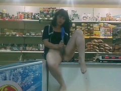 Russian MILF Fucks Herself with a Sex Toy in a Store