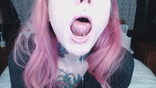 pink haired girl holds mouth wide open for you ;)