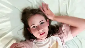Cute GF gets teased in bed with shorts on.