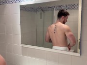 Muscular hairy jock ass exposed while stuck under the table