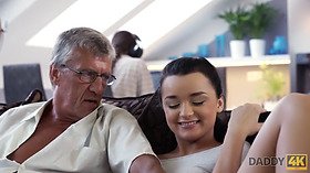 Naughty stepdad fucks stunning brunette on sofa with expert skills